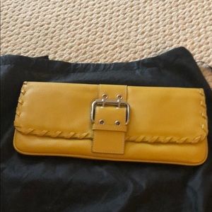 Bcbg leather mustard Clutch with strap